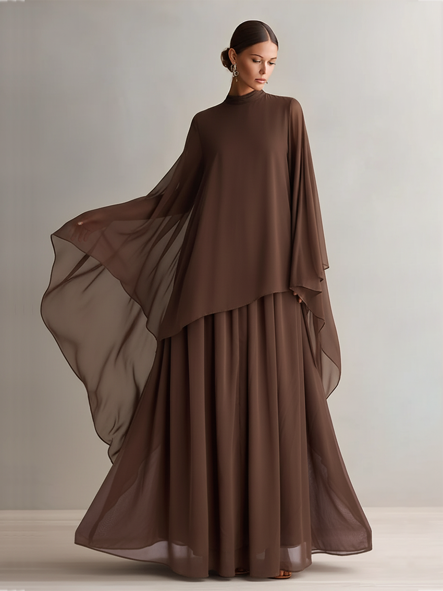Vestido de gasa marrón intenso con silueta maxi vaporosa y diseño de capa, estilo elegante y glamour moderno
