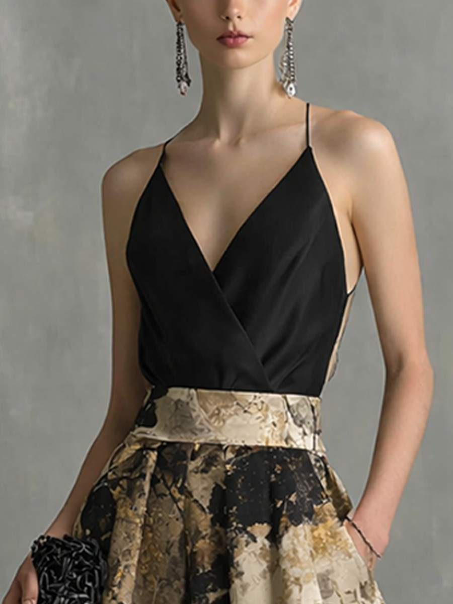 Vestido maxi elegante negro y beige con estampado abstracto, escote en V y tirantes