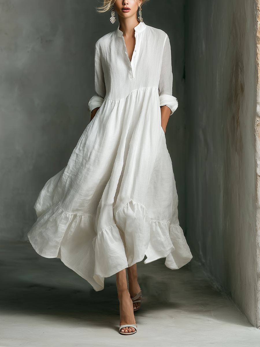 Vestido largo blanco de manga larga con volantes