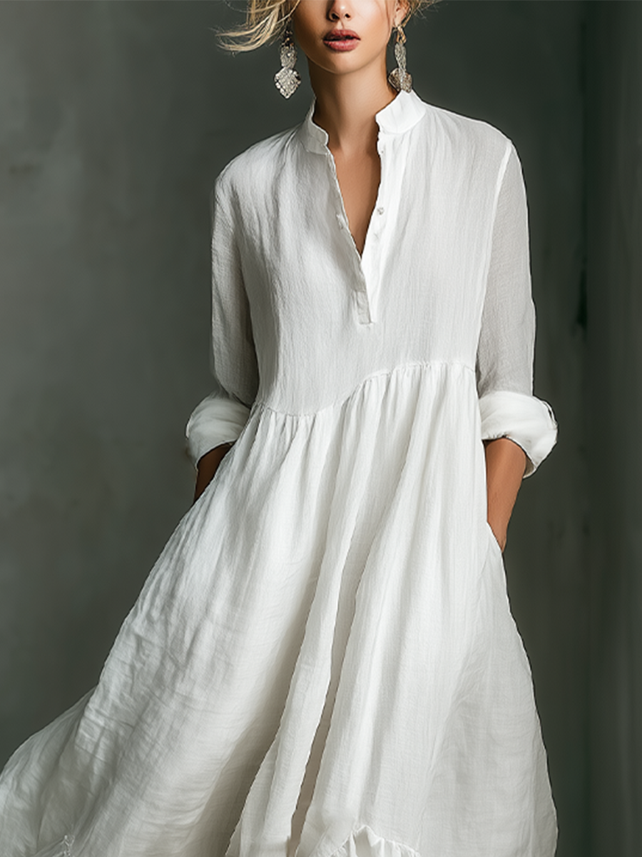 Vestido largo blanco de manga larga con volantes