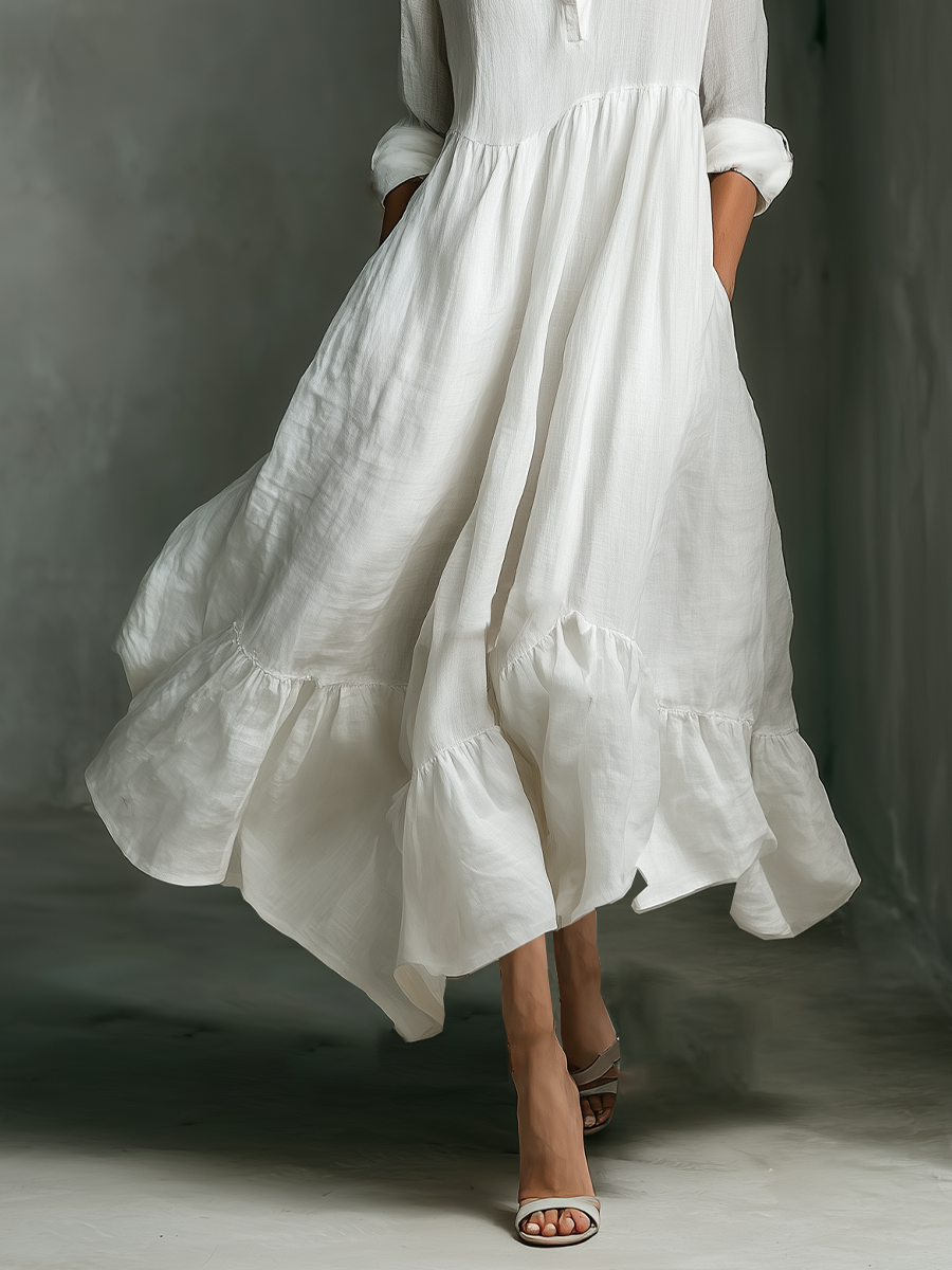 Vestido largo blanco de manga larga con volantes