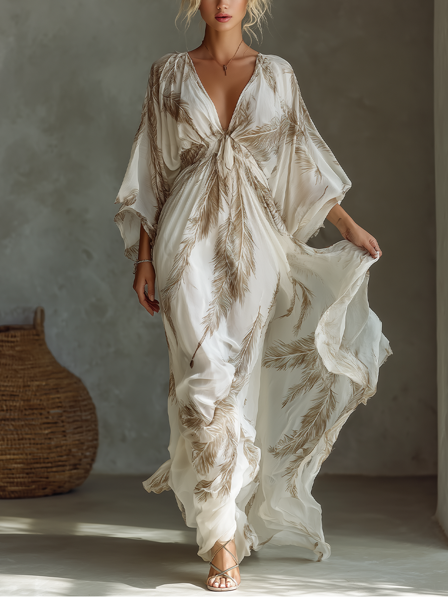 Vestido largo de gasa marfil y topo con mangas murciélago, delantero cruzado y estampado de hojas de palmera