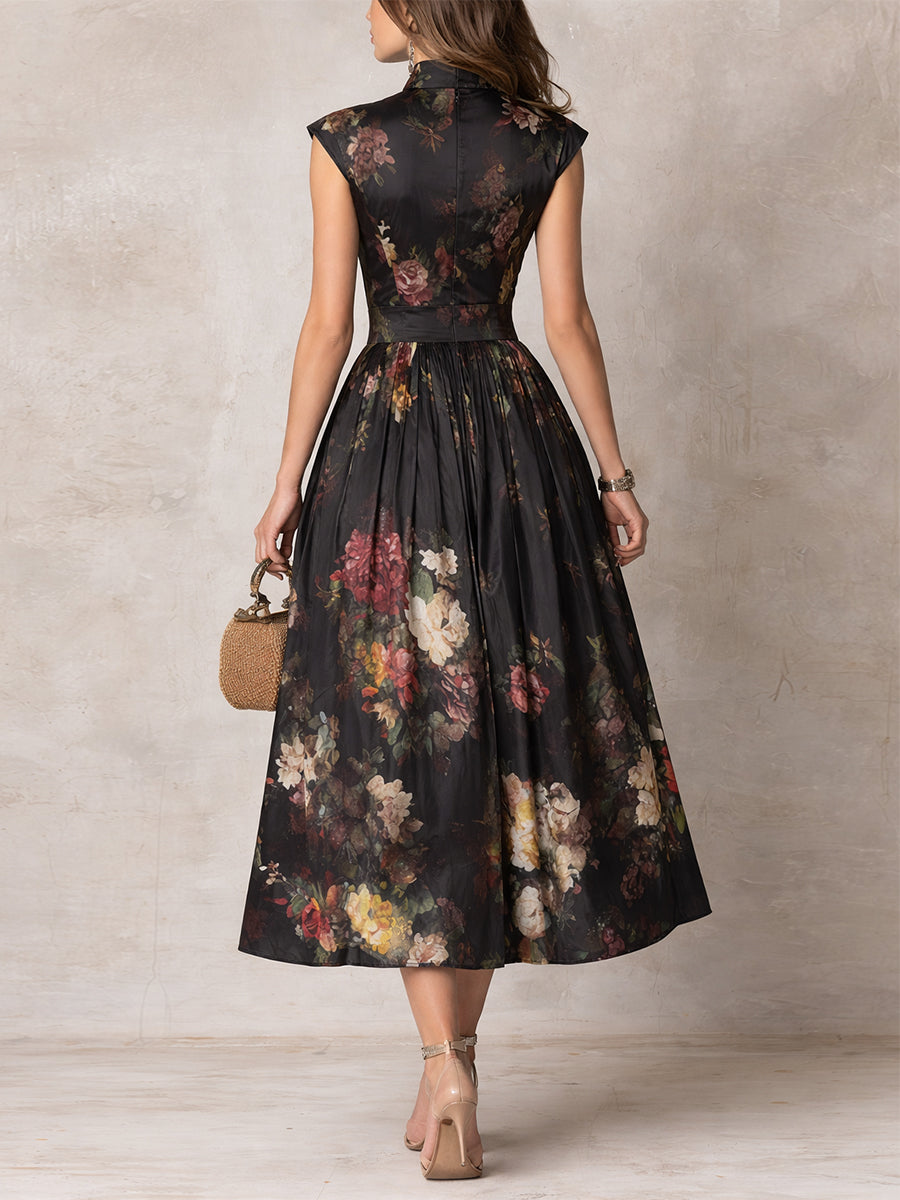 Vestido midi de seda plisado con estampado floral